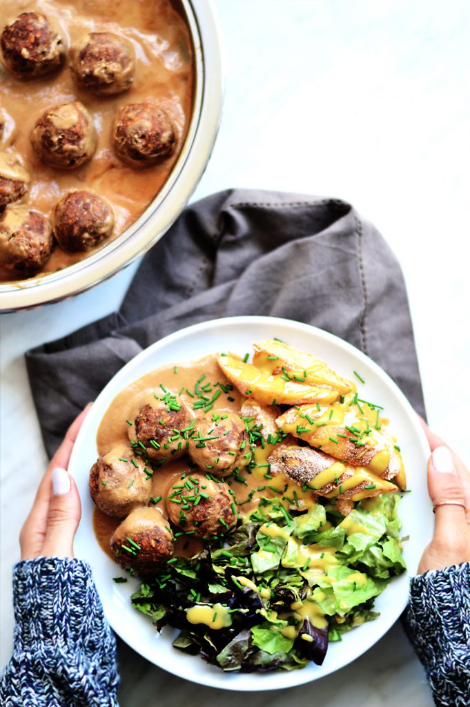 healthy vegan meatballs casserole and a plate with vegan meatballs, fries and salad