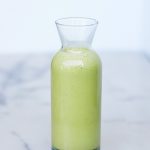oil-free basil dressing in a glass jar
