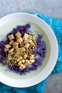 blueberry and yogurt porridge with toppings